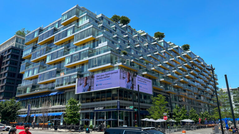 West Half apartments and retail from street view exterior of building