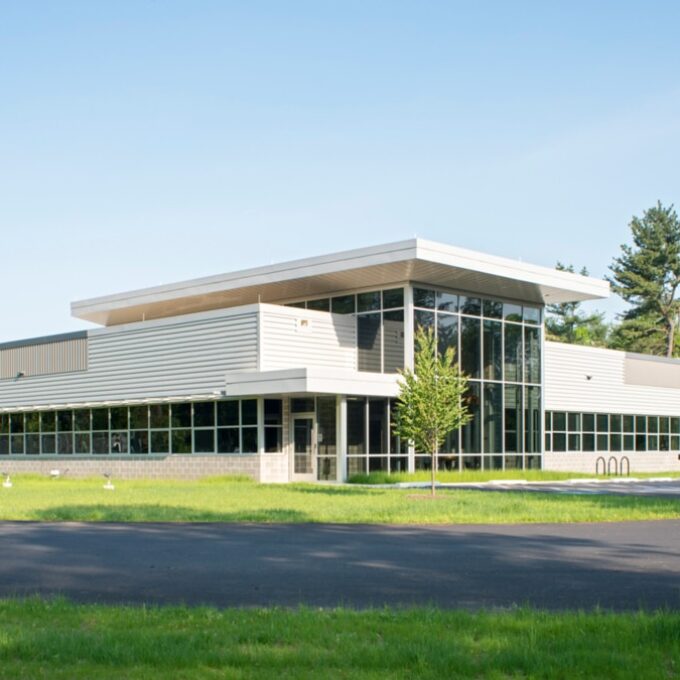 Exterior of water authority building with grass and trees