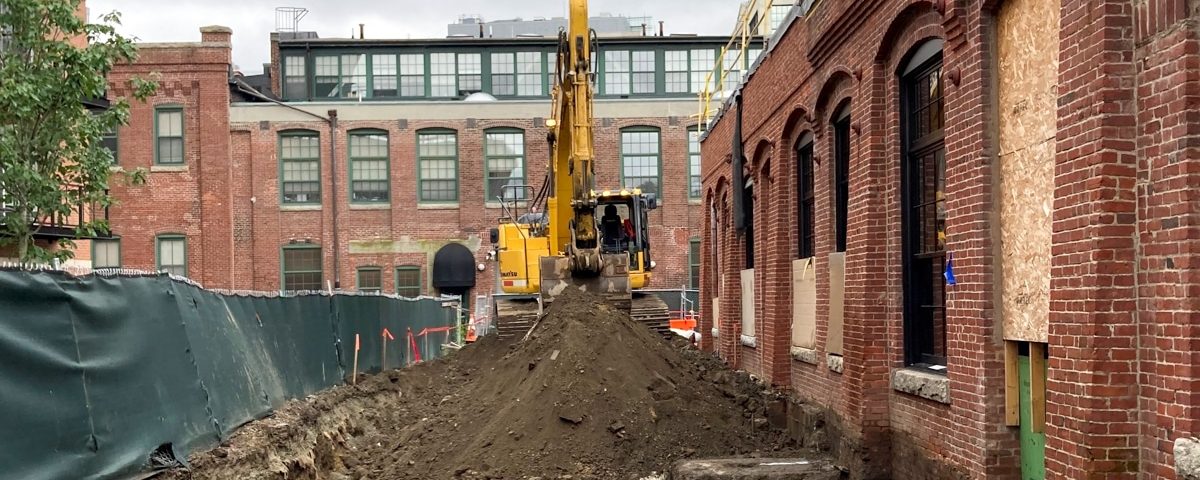 Historic Iron Foundry Remediation Site with heavy equipment and dirt