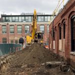 Historic Iron Foundry Remediation Site with heavy equipment and dirt