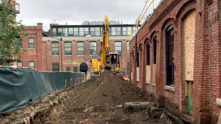 Historic Iron Foundry Remediation Site with heavy equipment and dirt