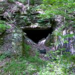 Roundtop abandoned mine land portal hole with trees and leaves