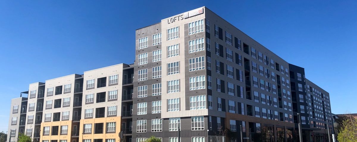 The Yard 56 mixed-use development in East Baltimore, pictured here with blue sky, received Urban Land Institute Baltimore's WaveMaker Award