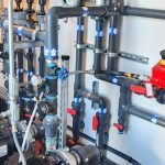 Petroleum facility piping and white walls