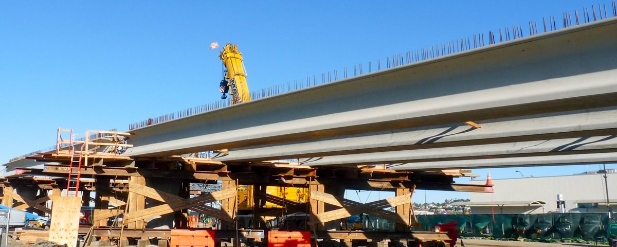 ongoing construction at San Diego Airport with crane and equipment