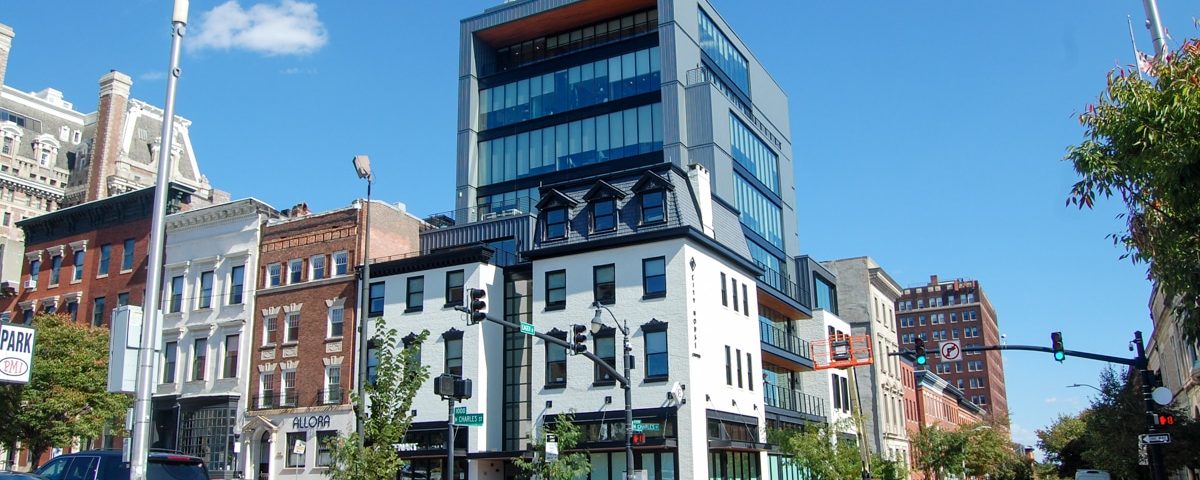 City House Charles full building view at street level with blue sky