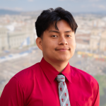 Headshot of Kevin Barrera Mejia with blurred image of Guatemala City in the background