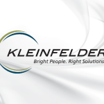 Kleinfelder logo on white marble background
