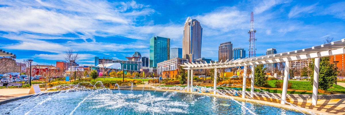 Charlotte North Carolina skyline from park with fountain