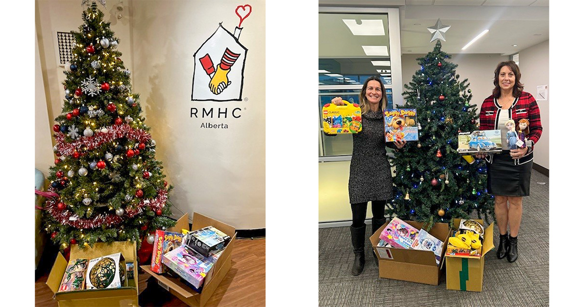 Staff standing with toy donations for Ronald McDonald House Charities