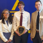 Photo of Daniel Phillips receiving the ASCE Pittsburgh Section’s 2024 Young Civil Engineer of the Year award