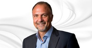 Pascal Hinnen Central Division Director joins Kleinfelder headshot on white marble background