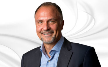 Pascal Hinnen Central Division Director joins Kleinfelder headshot on white marble background