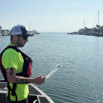 Kleinfelder Project Manager Jake Lippman conducts a boat survey as part of his environmental work for the San Diego Unified Port District
