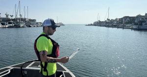 Kleinfelder Project Manager Jake Lippman conducts a boat survey as part of his environmental work for the San Diego Unified Port District