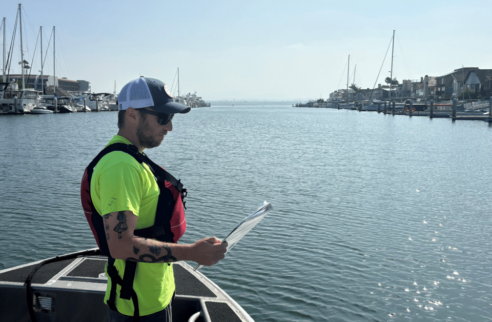 Kleinfelder Project Manager Jake Lippman conducts a boat survey as part of his environmental work for the San Diego Unified Port District