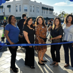 Terri London, Jocelyn Angulo, Gina Chapa, Anna Finlay and Joey Fernandez pose for a ribbon cutting at the City of Escondido's Grand Avenue Vision Project Celebration