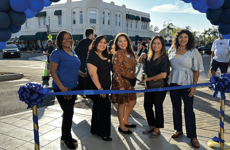 Terri London, Jocelyn Angulo, Gina Chapa, Anna Finlay and Joey Fernandez pose for a ribbon cutting at the City of Escondido's Grand Avenue Vision Project Celebration