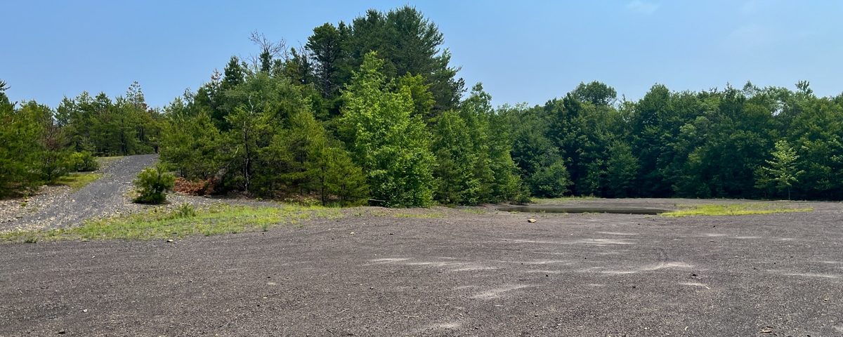 Fall Brook West abandoned mine land with gravel lot and trees