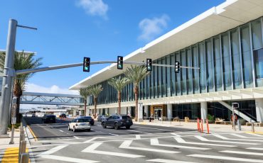 San Diego International Airport New Terminal 1 project exterior facade with road and cars