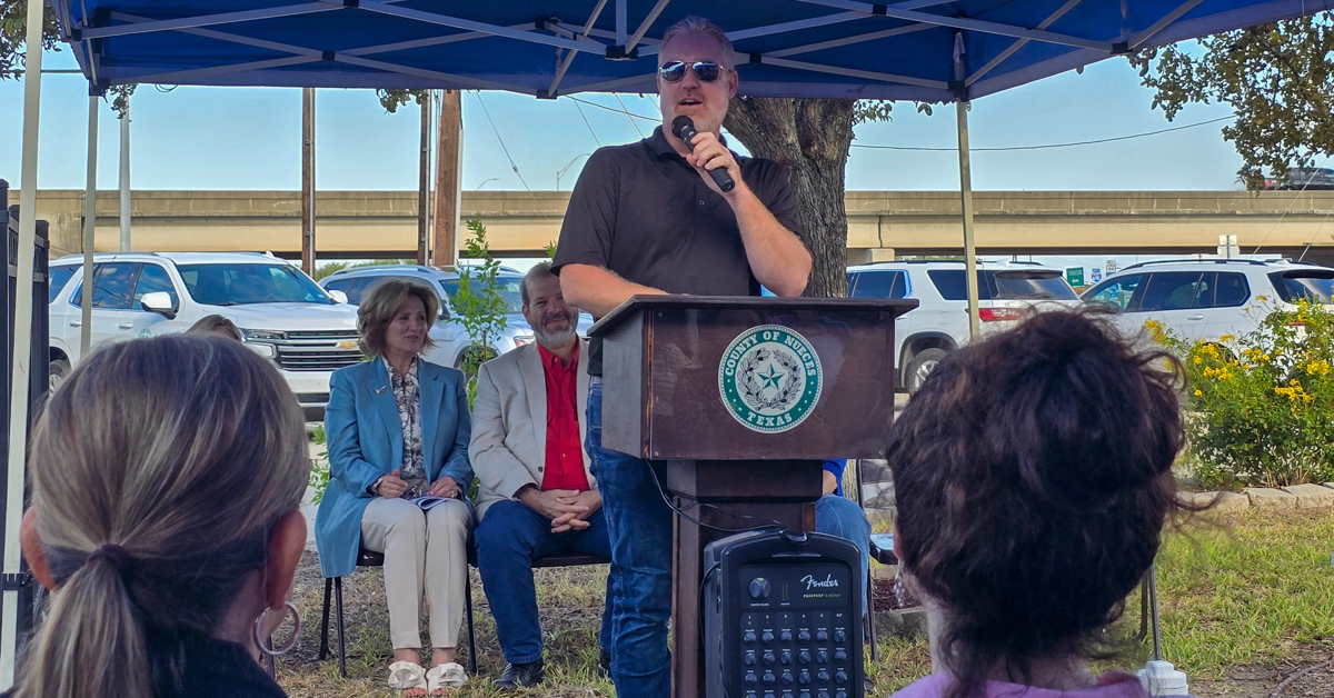 Nick Dornak speaking at the ribbon cutting ceremony