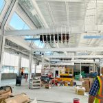 Vine Street Transit construction interior building with person in safety gear
