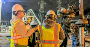 North and South Metro Interceptors project individuals in safety gear working at night