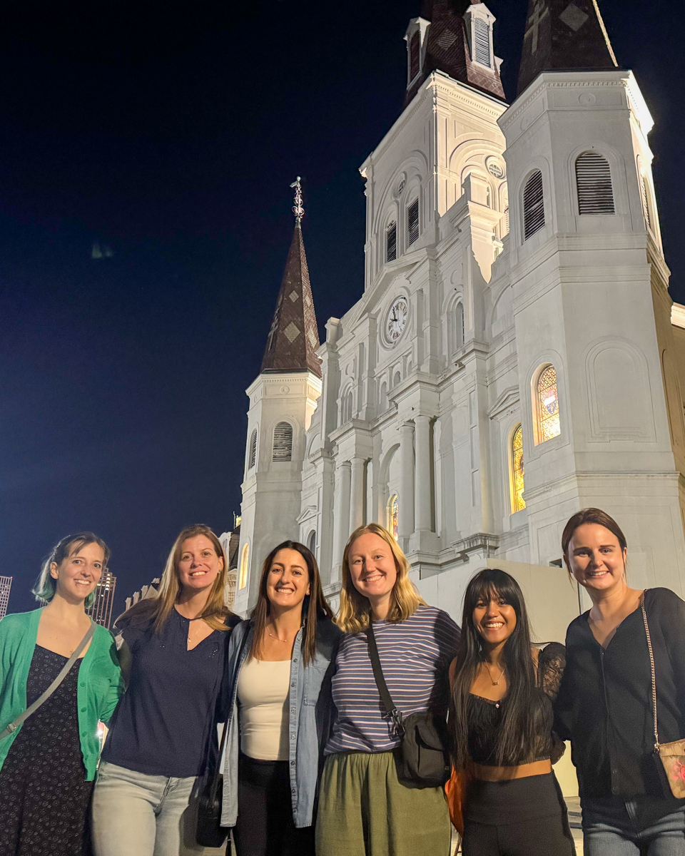 Group poses in New Orleans for ghost tour
