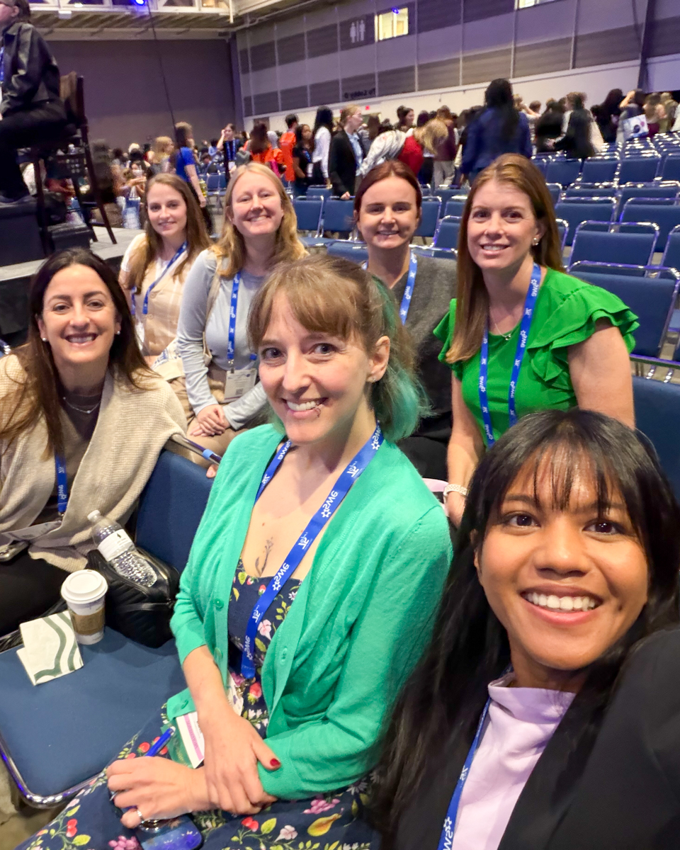 Group of attendees sitting in auditorium during SWE WE25 event