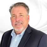 Kleinfelder welcomes Brian Wolf headshot on white marble background