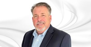 Kleinfelder welcomes Brian Wolf headshot on white marble background