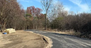 Photo of paved road and trees (Chessie Circle in Wood County, Ohio)