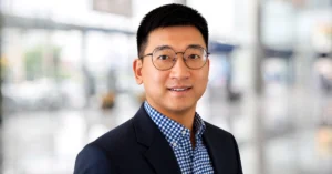 headshot of Chen Chen, Senior Vice President of Corporate Development