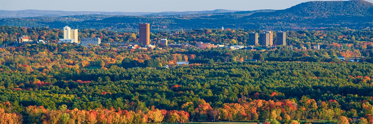 Amherst Massachusetts Amherst Massachusetts aerial view in the fall with autumn trees and university campus in distance