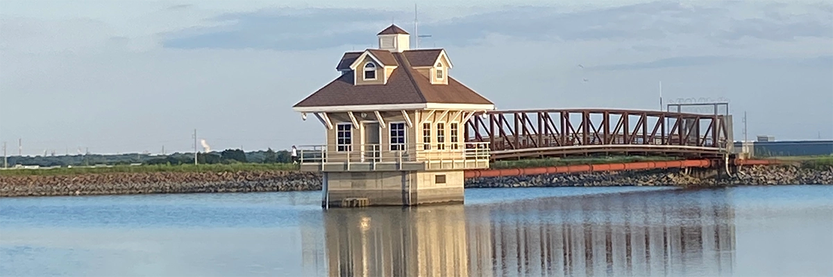 Newark Delaware skyline over water with pier